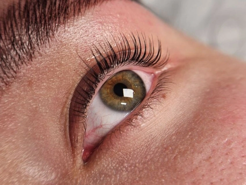 Classic lash lift and tint result with a defined curl on natural lashes